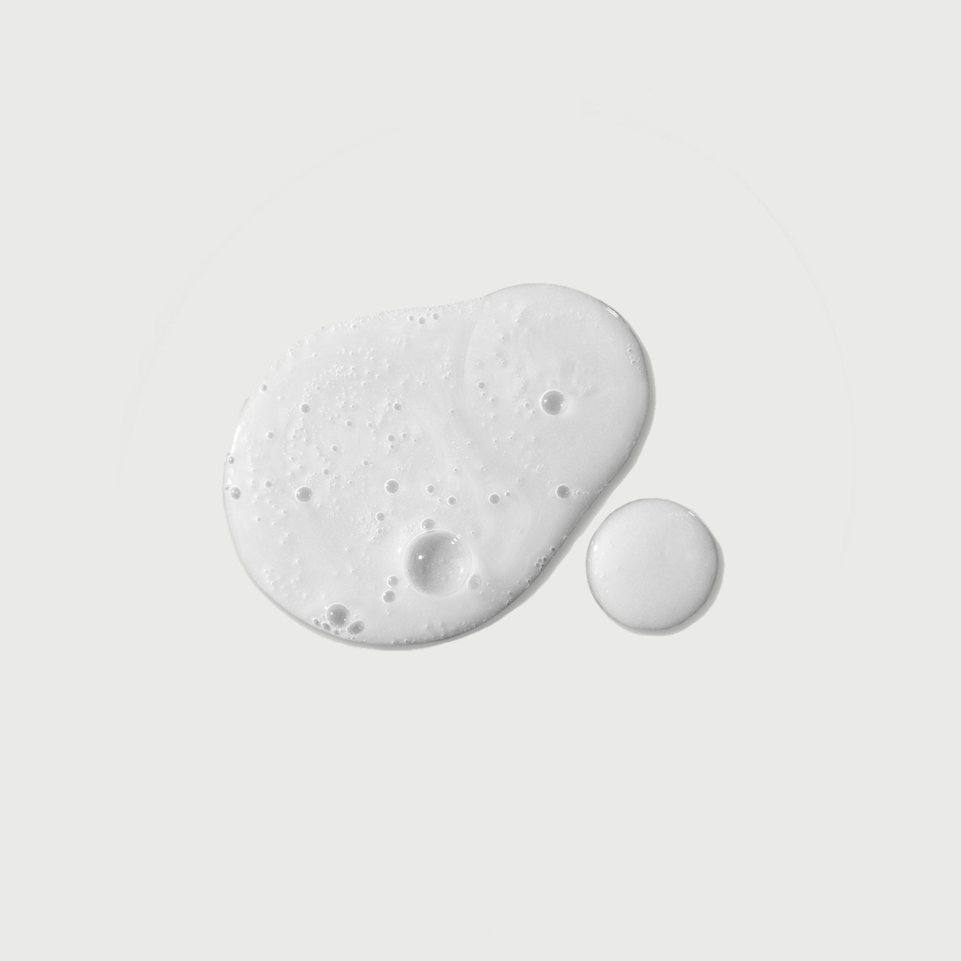 the-purifier-niacinamide-serum-body-wash-b9 NATR-40012-Swatch-The-Purifier-Niacinamide-Serum-Body-Wash-bonebkgd.jpg