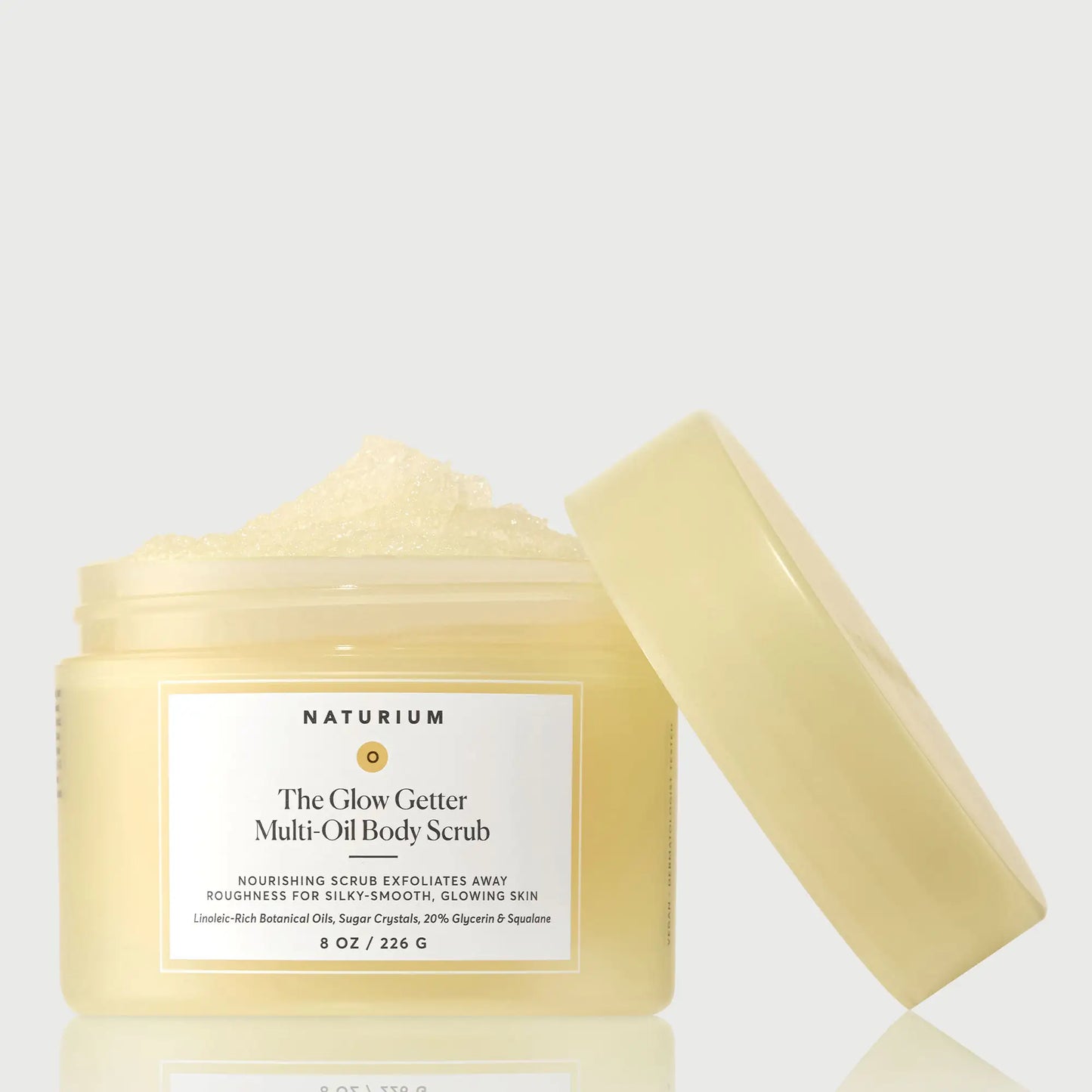 the-glow-getter-multi-oil-body-scrub-z6 NATR-40028-GlowGetter-Multi-Oil-Body-Scrub-Front-CapOff-bonebkgd.webp