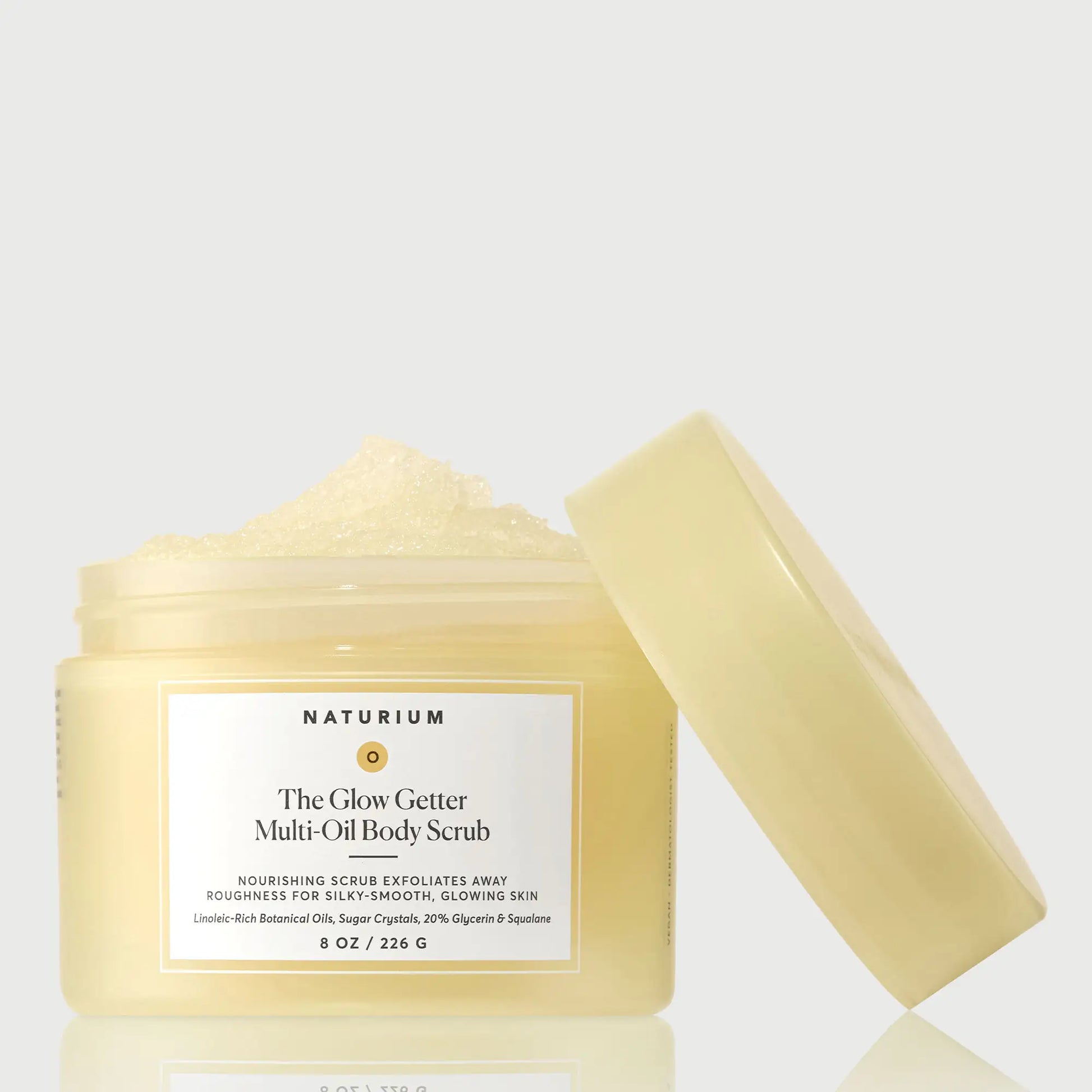 the-glow-getter-multi-oil-body-scrub-z6 NATR-40028-GlowGetter-Multi-Oil-Body-Scrub-Front-CapOff-bonebkgd.webp